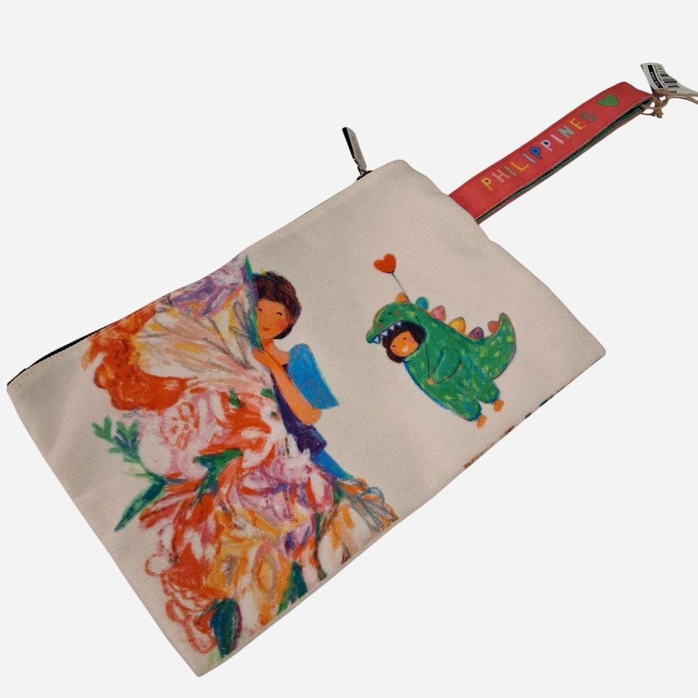Womens Phillipines canvas pouch with graphic of a girl with a green dinosaur